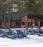 Photo of large fleet of snowmobiles at NEOC