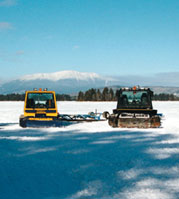 Photo of snowmobile trail groomers at NEOC